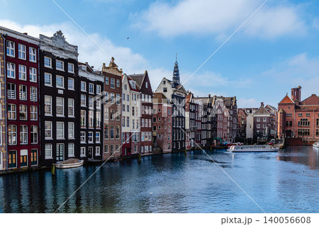 Unique architecture along the canal in Amsterdam showcases historic Dutch buildings Unique architecture along the canal in Amsterdam showcases historic Dutch buildings 140056608