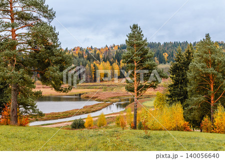Autumn landscape with colorful foliage and a serene lake in the countryside 140056640