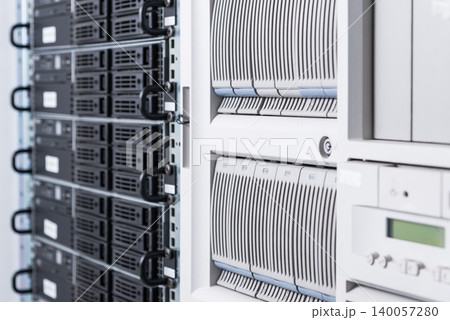 Cluster of data storage hard drives inside server room 140057280