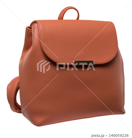 Brown leather backpack with minimalist flap closure isolated on white background. Side view of a stylish female rucksack with grained texture. Brown leather backpack with minimalist flap closure isolated on white background. Side view of a stylish female rucksack with grained texture. 140059226