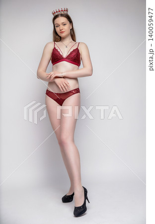 Young beautiful woman dressed in lingerie Young beautiful woman dressed in lingerie 140059477