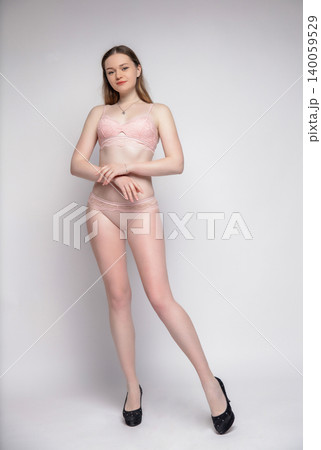 Sexy brunette dressed in lingerie Sexy brunette dressed in lingerie 140059529