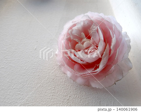 Pink fabric rose on white background. Pink fabric rose on white background. 140061906