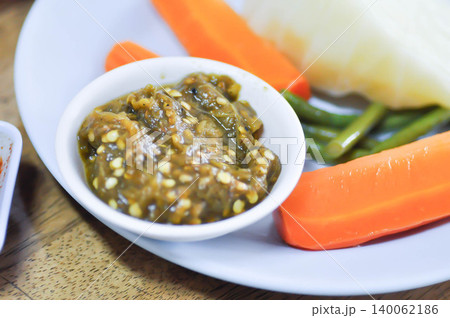 chili dip or chili paste or Thai chili paste and vegetable or boiled vegetable chili dip or chili paste or Thai chili paste and vegetable or boiled vegetable 140062186