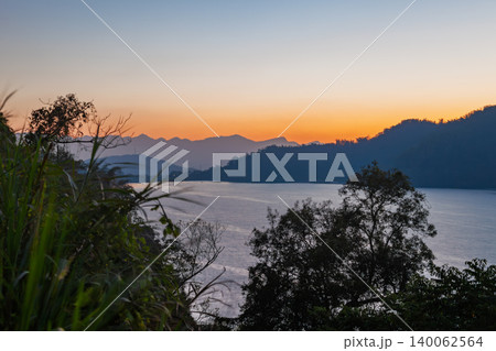 Sun Moon Lake sunset shoreline view in Taiwan Sun Moon Lake sunset shoreline view in Taiwan 140062564
