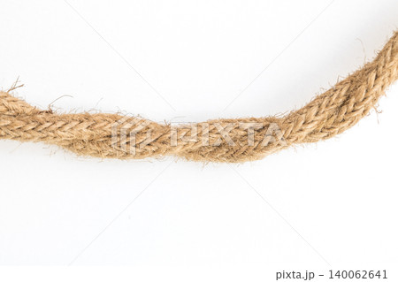 Close up old brown rope on white background Close up old brown rope on white background 140062641