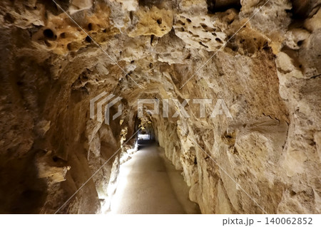 Mystical underground stone tunnel and pathway at Quinta da Regaleira in Sintra, Portugal Mystical underground stone tunnel and pathway at Quinta da Regaleira in Sintra, Portugal 140062852
