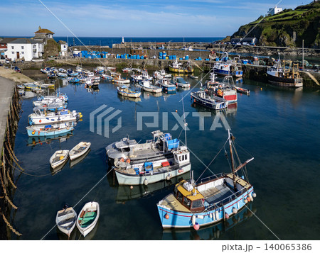 Aerial view of the harbor at Mevagissey on the south coast of Cornwall, England. Aerial view of the harbor at Mevagissey on the south coast of Cornwall, England. 140065386
