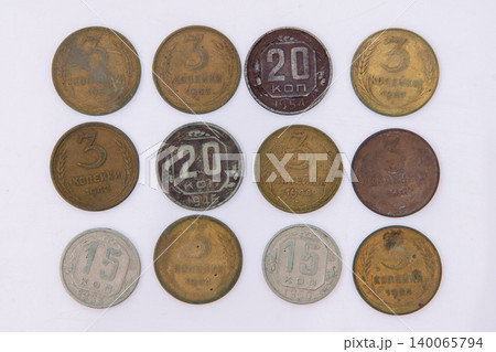 Collection of old Soviet Union coins. Vintage USSR kopeks numismatics set on a white background Collection of old Soviet Union coins. Vintage USSR kopeks numismatics set on a white background 140065794