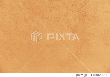 Blank cement plaster wall orange color. concrete wall texture for background Blank cement plaster wall orange color. concrete wall texture for background 140065867