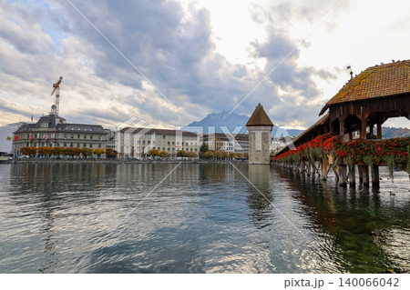 Lucerne, Switzerland-October 18,2019:The old wood Chapel Bridge is famous and beautiful landmark in Lucerne, Switzerland 140066042