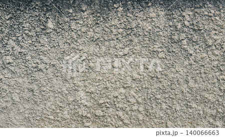 Abstract yellow concrete wall texture background with copy space. Pastel mustard cement surface. Abstract yellow concrete wall texture background with copy space. Pastel mustard cement surface. 140066663