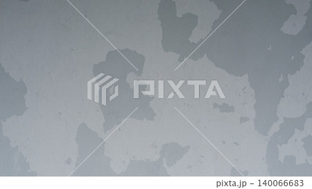 Old grey peeling paint texture on concrete wall background Old grey peeling paint texture on concrete wall background 140066683