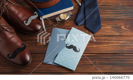 Father's Day concept flat lay with greeting card and accessories Father's Day concept flat lay with greeting card and accessories 140066770