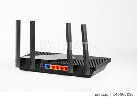 Modern Wireless Router with Four Antennas - High-Speed Wi-Fi Network Device isolated on white Modern Wireless Router with Four Antennas - High-Speed Wi-Fi Network Device isolated on white 140066850
