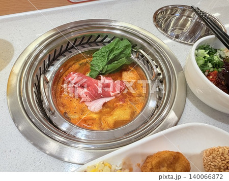 Chinese Hot Pot with Spicy Broth and Fresh Ingredients Chinese Hot Pot with Spicy Broth and Fresh Ingredients 140066872