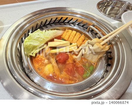 Chinese Hot Pot with Spicy Broth and Fresh Ingredients Chinese Hot Pot with Spicy Broth and Fresh Ingredients 140066874