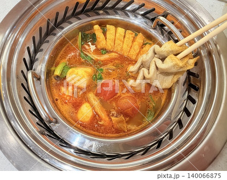 Chinese Hot Pot with Spicy Broth and Fresh Ingredients Chinese Hot Pot with Spicy Broth and Fresh Ingredients 140066875