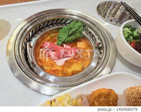 Chinese Hot Pot with Spicy Broth and Fresh Ingredients Chinese Hot Pot with Spicy Broth and Fresh Ingredients 140066879