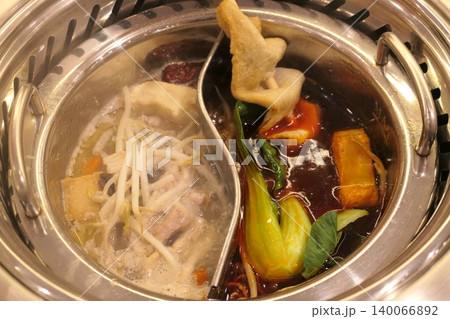 Chinese Hot Pot with Spicy Broth and Fresh Ingredients Chinese Hot Pot with Spicy Broth and Fresh Ingredients 140066892