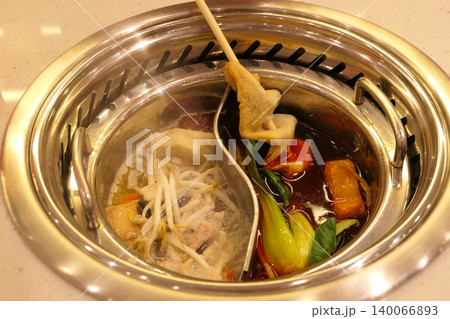 Chinese Hot Pot with Spicy Broth and Fresh Ingredients Chinese Hot Pot with Spicy Broth and Fresh Ingredients 140066893