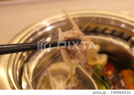 Chinese Hot Pot with Spicy Broth and Fresh Ingredients Chinese Hot Pot with Spicy Broth and Fresh Ingredients 140066910