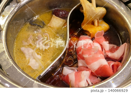 Chinese Hot Pot with Spicy Broth and Fresh Ingredients Chinese Hot Pot with Spicy Broth and Fresh Ingredients 140066929
