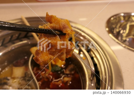 Chinese Hot Pot with Spicy Broth and Fresh Ingredients Chinese Hot Pot with Spicy Broth and Fresh Ingredients 140066930