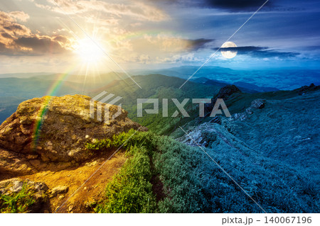 day meet night. mountainous countryside scenery. epic sky above the distant valley at twilight. sun and moon over green meadows and rocks on the hill. wonderful nature scenery of carpathian mountains day meet night. mountainous countryside scenery. epic sky above the distant valley at twilight. sun and moon over green meadows and rocks on the hill. wonderful nature scenery of carpathian mountains 140067196