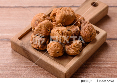Dried whole fig as an ingredient for sweet desserts. Dried figs as a food 140067258