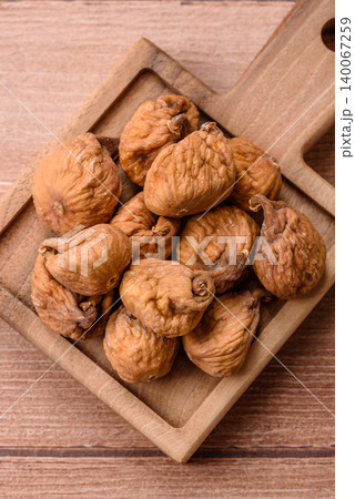 Dried whole fig as an ingredient for sweet desserts. Dried figs as a food 140067259