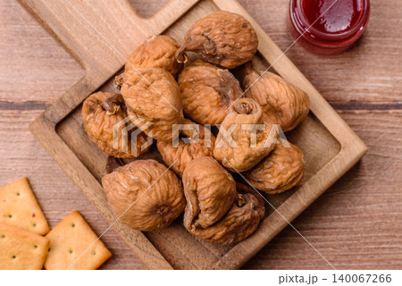 Dried whole fig as an ingredient for sweet desserts. Dried figs as a food Dried whole fig as an ingredient for sweet desserts. Dried figs as a food 140067266