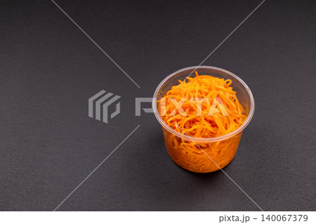 Korean style carrot salad in plastic container Korean style carrot salad in plastic container 140067379