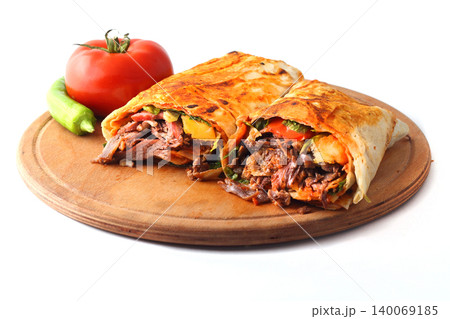 Doner kebab or shawarma sandwich isolated on white background Doner kebab or shawarma sandwich isolated on white background 140069185