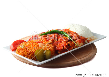 Turkish cuisine. Doner kebab meat with pommes frites potatoes and salad on plate isolated on white background 140069186