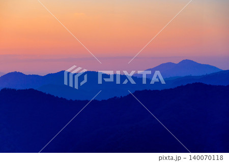 sunset sky on mountain hill, photo with partly blur and also had noise & gain sunset sky on mountain hill, photo with partly blur and also had noise & gain 140070118