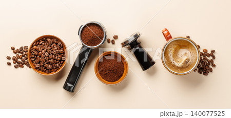 Coffee accessories and espresso tools on light beige background Coffee accessories and espresso tools on light beige background 140077525
