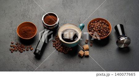 Espresso preparation tools and coffee beans flat lay composition 140077665