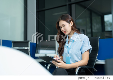 Business people working in the work area with laptop and tablet at the desk. business concepts. Business people working in the work area with laptop and tablet at the desk. business concepts. 140081235