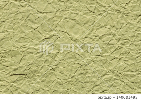 Yellow green crumpled paper texture background with wrinkled surface and natural fold pattern 140081495