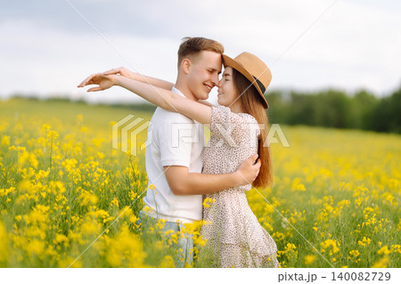 Happy men and women in style enjoy the time spent together. The concept of love, test, relationship. Happy men and women in style enjoy the time spent together. The concept of love, test, relationship. 140082729