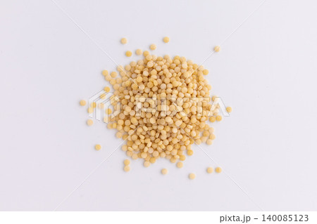 raw couscous isolated on white 140085123