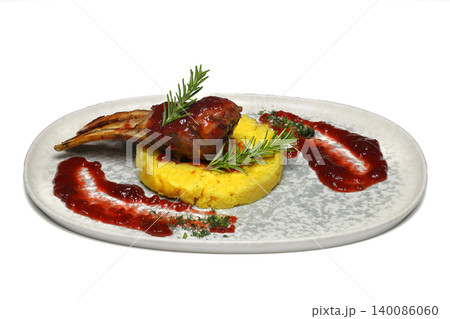 Cutlet and mashed potatoes in plate on isolated white background 140086060