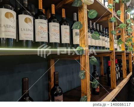 Cordoba, Argentina - May 29, 2026: Wine bottles on display at Parrilla del Boulevard restaurant Cordoba, Argentina - May 29, 2026: Wine bottles on display at Parrilla del Boulevard restaurant 140086117