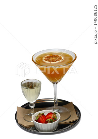 fresh alcohol coctail with fruits on the black background fresh alcohol coctail with fruits on the black background 140086125