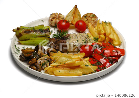 Roasted meat, French fries and vegetables isolated white background. 140086126