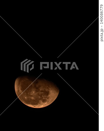 Large Orange Blood Moon in Dark Night Sky Large Orange Blood Moon in Dark Night Sky 140086779