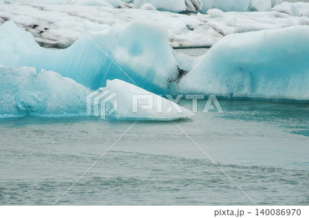 Icebergs in Jokulsarlon, a glacial lake in Iceland Icebergs in Jokulsarlon, a glacial lake in Iceland 140086970