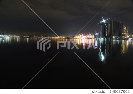 City Lights Reflected on Water at Night City Lights Reflected on Water at Night 140087062