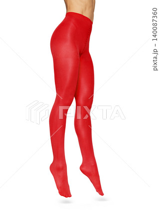 Woman's legs wearing vibrant red tights floating Woman's legs wearing vibrant red tights floating 140087360